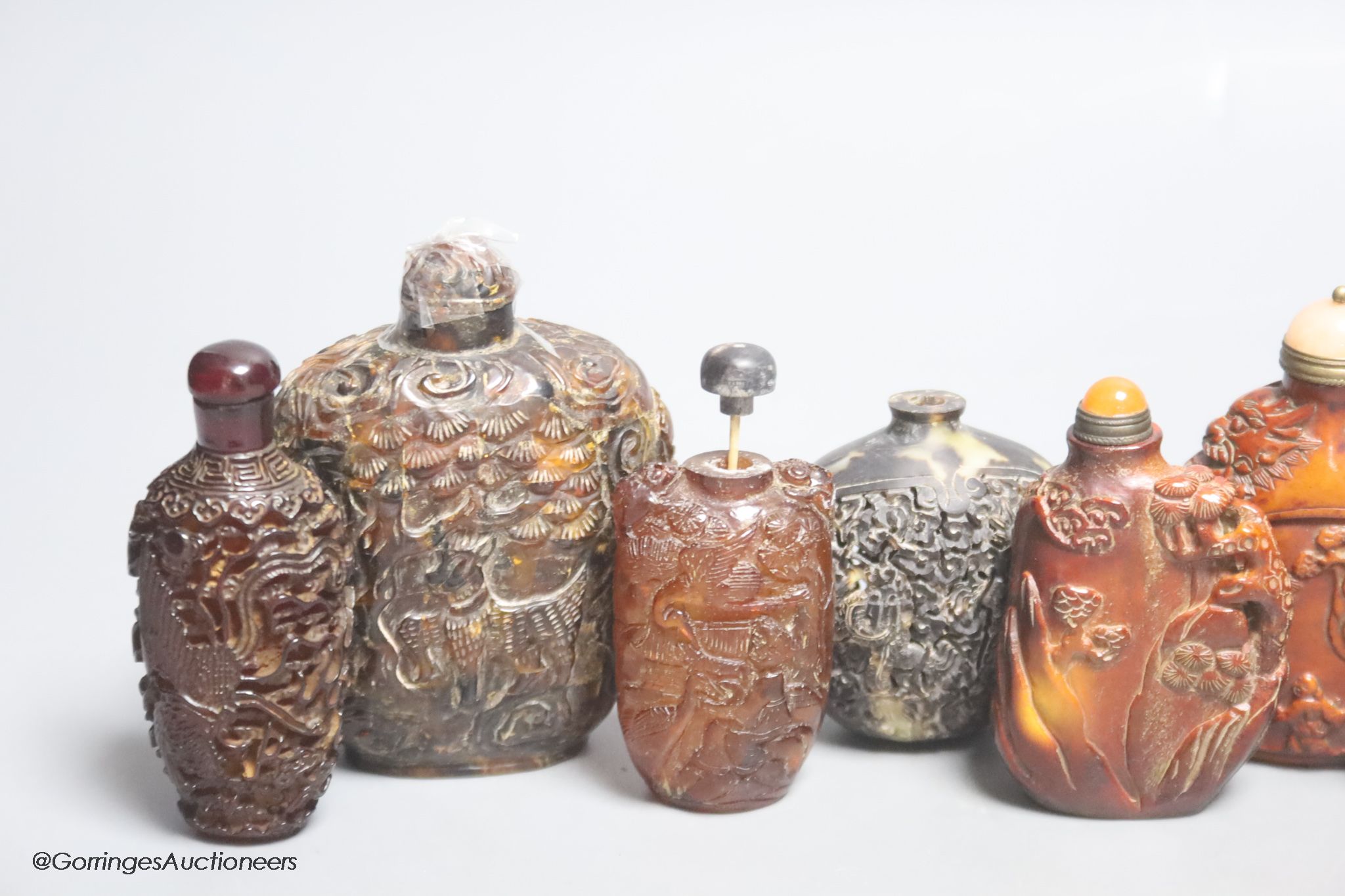 A collection of Chinese horn, tortoiseshell and coral etc. snuff bottles